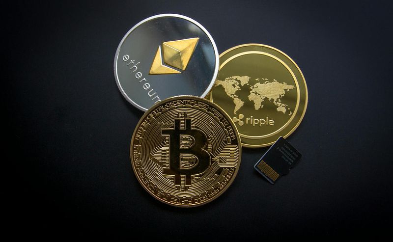 Bitcoin coin on financial chart representing bitcoin-backed bond collateral