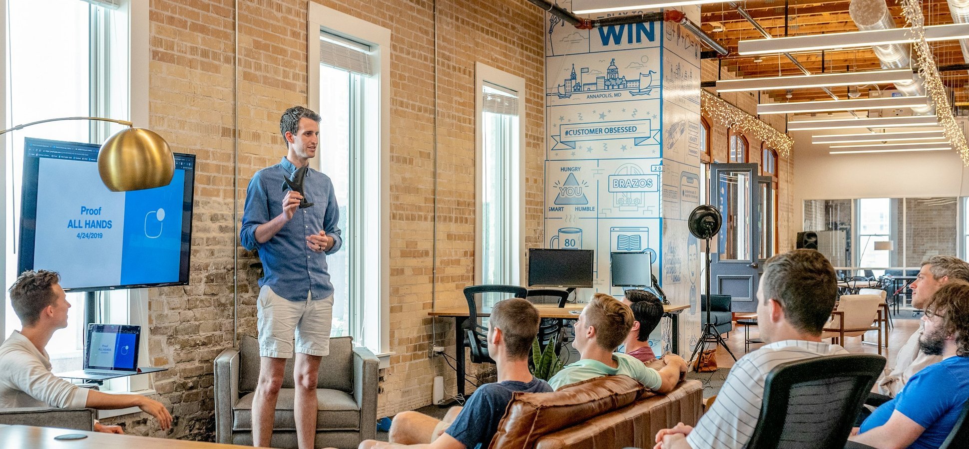 Coinbase office layoffs AI-native restructuring May 2026