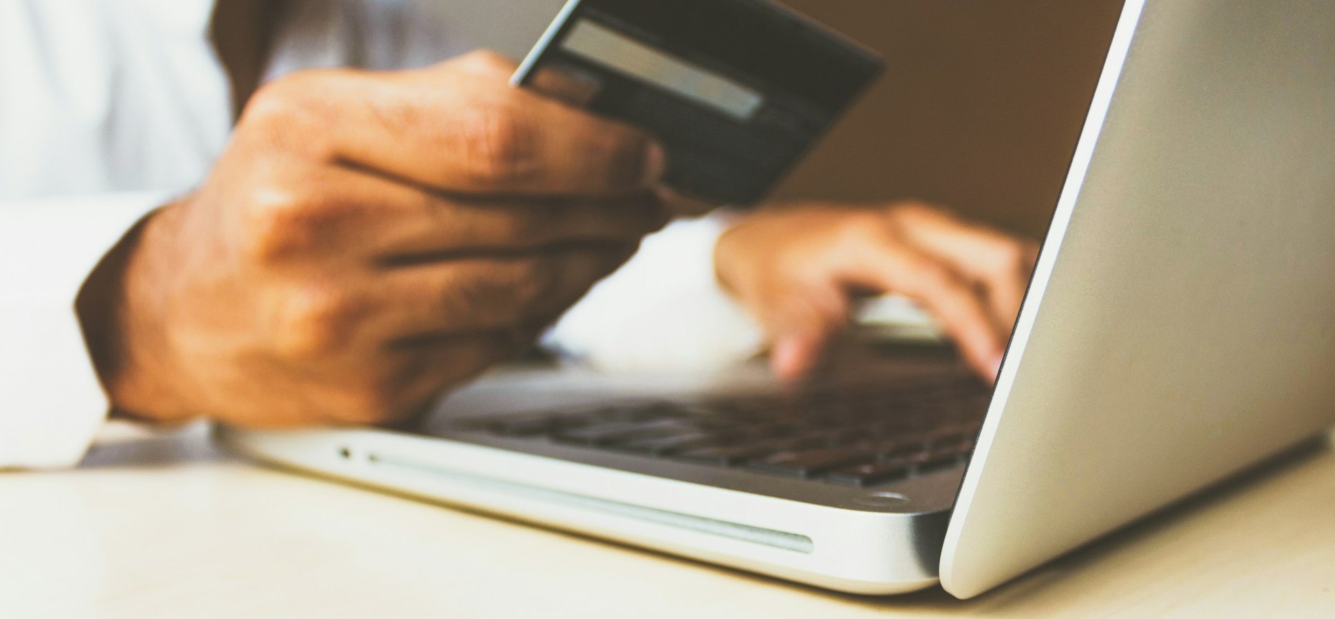 USB drive plugged into a laptop illustrating crypto wallet malware