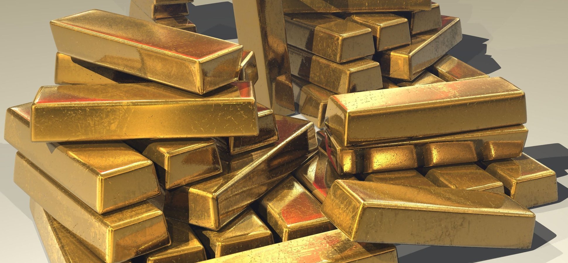 Gold bars representing Tether tokenized gold lending via Ledn