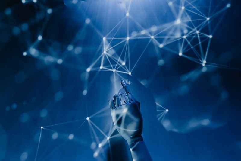 Robotic hand reaching toward a digital network, representing public ownership of AI companies