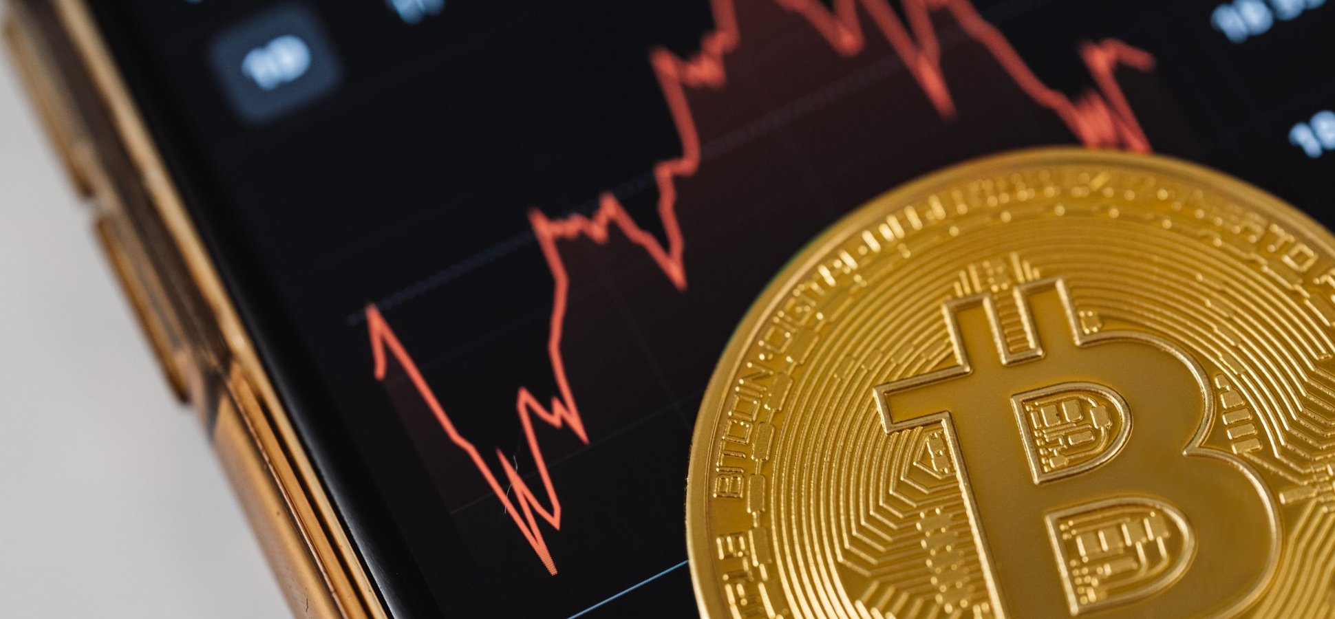 Bitcoin coin on a market chart after the July bitcoin options expiry
