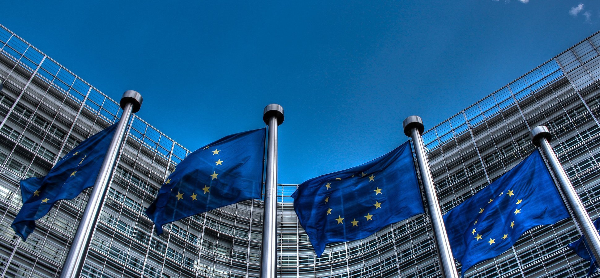 European Union flags outside the European Commission, symbolizing Ripple's MiCA crypto license