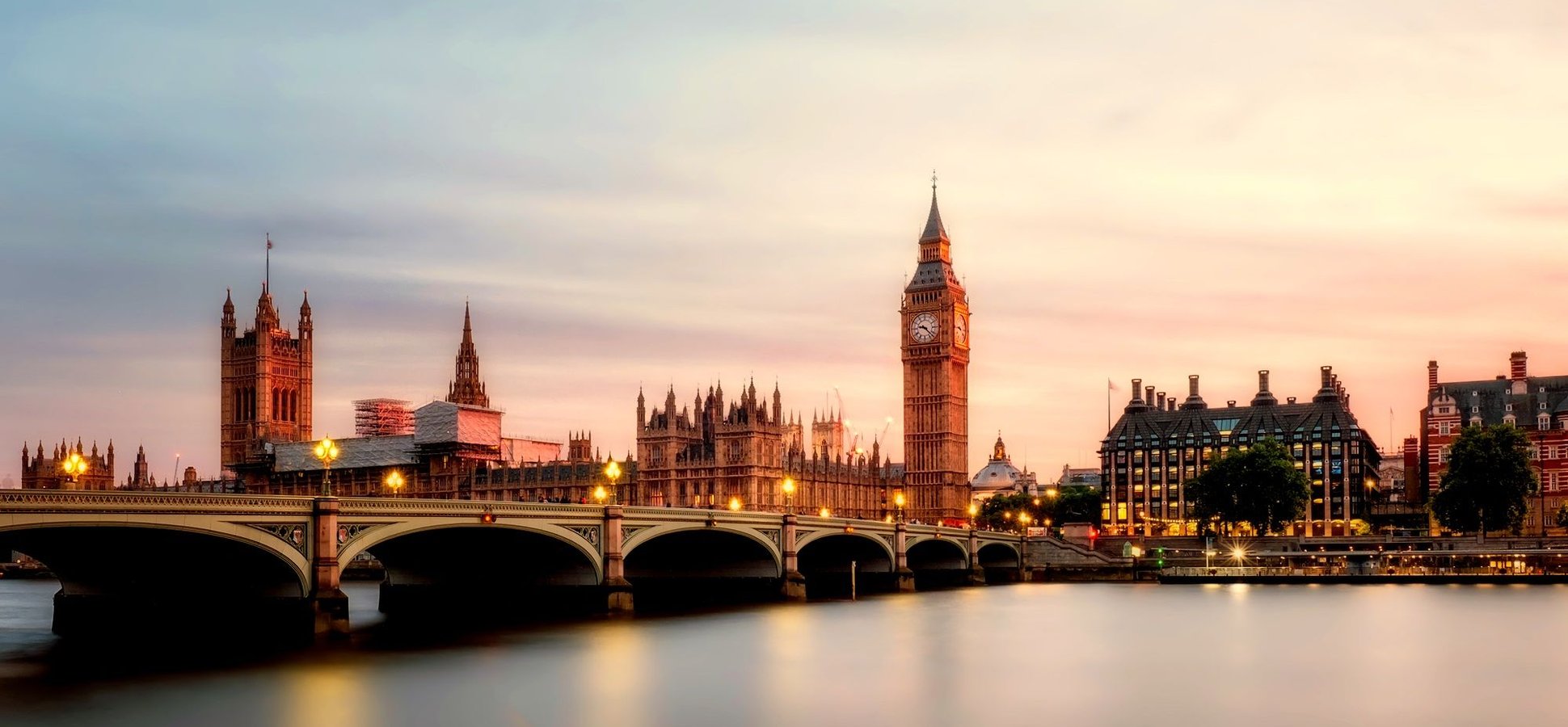 London skyline at dusk as Coinbase UK stock trading opens to British users